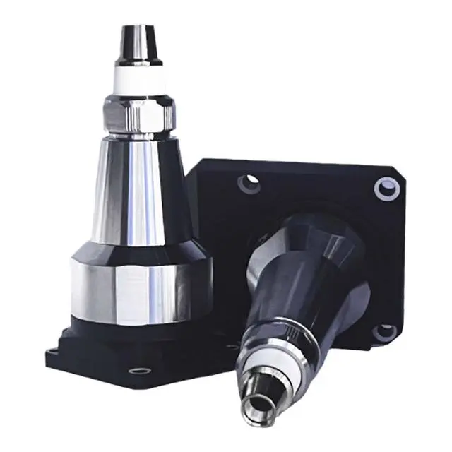 Capacitive sensing nozzle with amplifier for laser cutting head